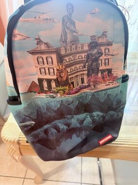 Sprayground Surreal Mansion Graphic Backpack Teal Blue Pink